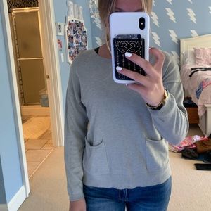 Super cute green sweater with front pockets